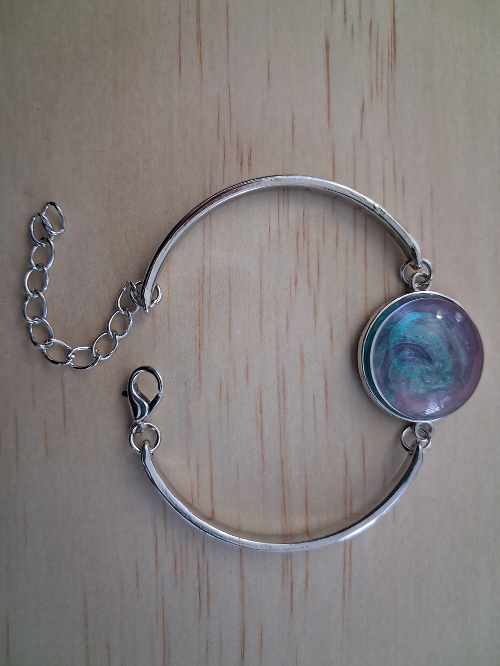 Silver Bracelet with Purple-Green Swirl Cabochon